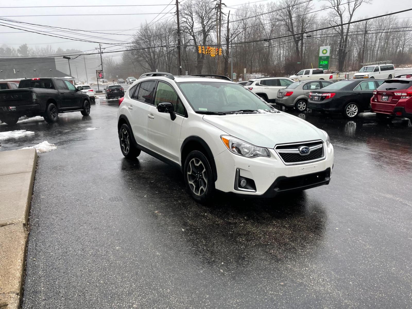 2017 White /Black Subaru Crosstrek 2.0i Limited PZEV CVT (JF2GPANC4HH) with an 2.0L I4 DOHC 16V engine, Automatic transmission, located at 11115 Chardon Rd. , Chardon, OH, 44024, (440) 214-9705, 41.580246, -81.241943 - This 2017 Subaru Crosstrek 2.0i Limited with CVT (Continuously Variable Transmission) offers a luxurious and safe driving experience. It features a leather interior, heated seats, and convenient technology such as navigation and a backup camera. A power moonroof brings a touch of the outdoors inside - Photo #2